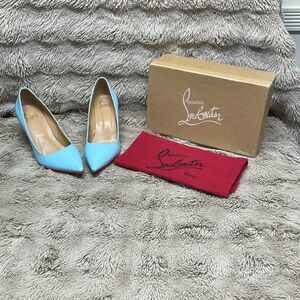 Christian Louboutin Light Blue Heels with Red Soles